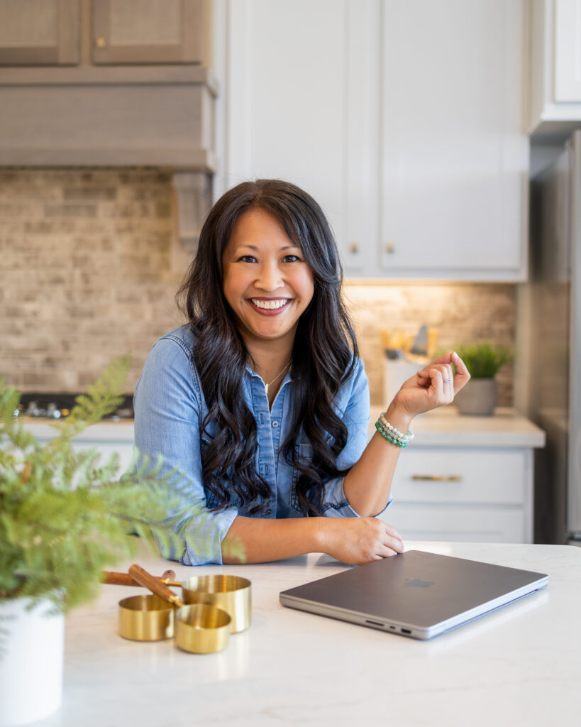 Meisie Beauvais Seasoned Strategist standing at the kitchen island